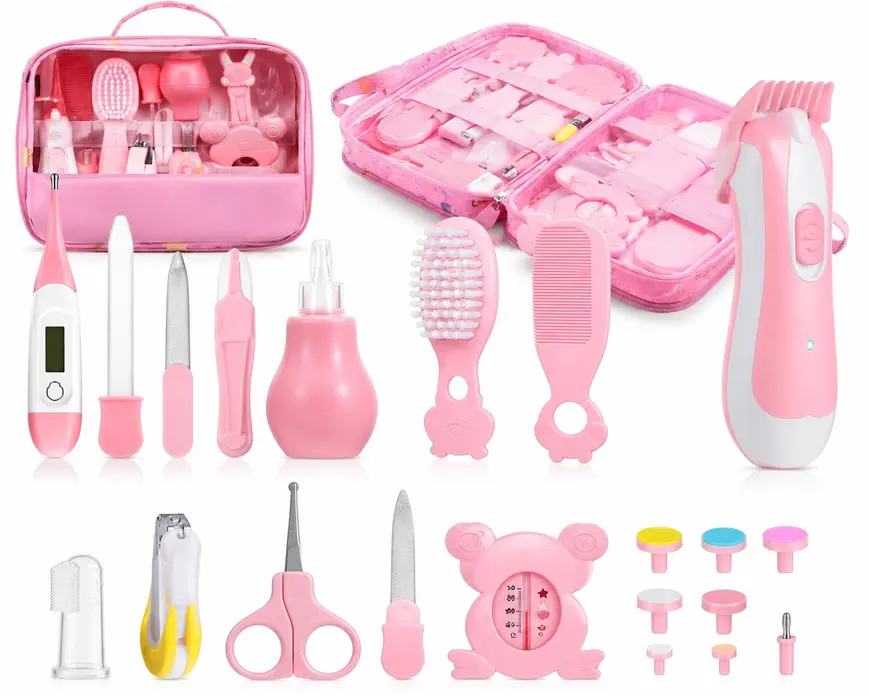 Complete newborn baby grooming kit with electric nail trimmer, brush, comb, scissors, thermometer, and healthcare essentials in a pink travel case.